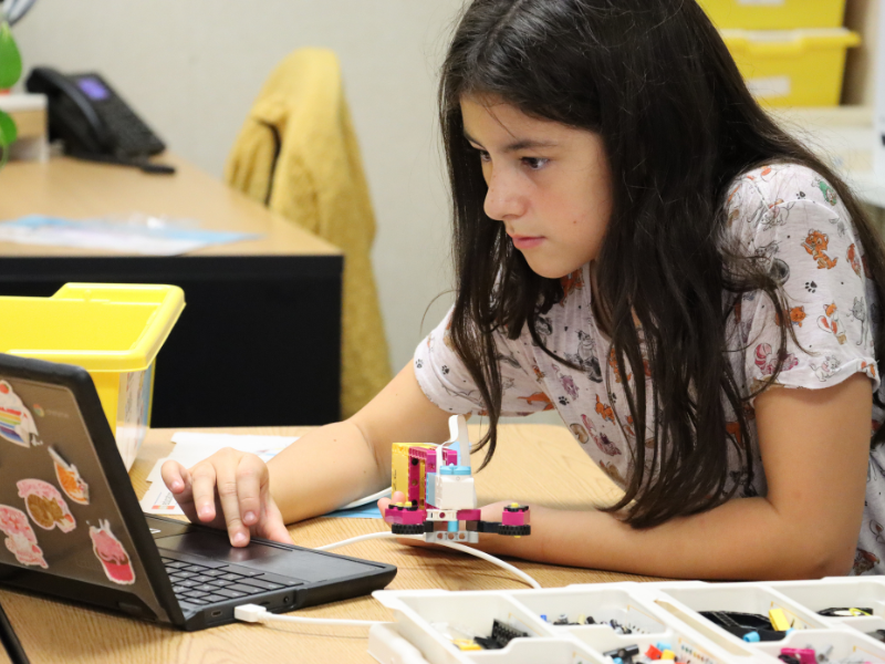 A students works on a lego project